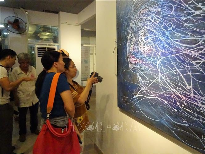 Vernissage d’une exposition franco-vietnamienne à Hô Chi Minh-ville - ảnh 1