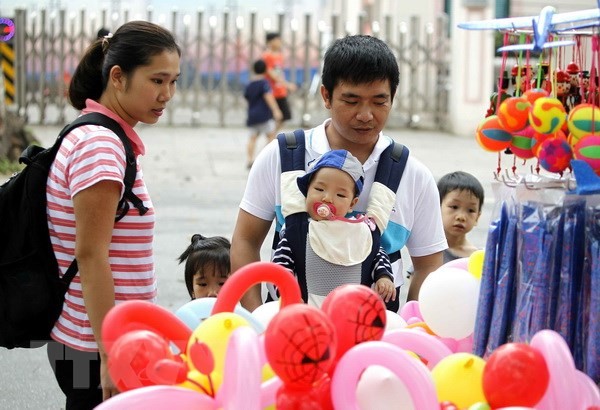 EIU、ベトナムの大都市での生活水準の改善を評価 - ảnh 1