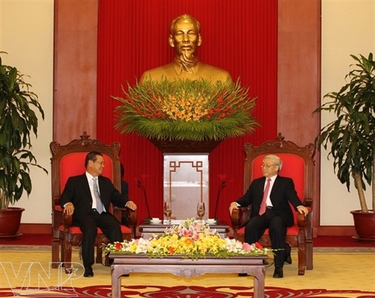 阮富仲会见老挝常务副总理宋沙瓦.凌沙瓦 - ảnh 1