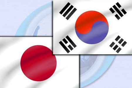 日本和韩国同意修复双边关系 - ảnh 1