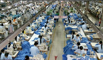 越南纺织品服装逐渐占领国内市场 - ảnh 2