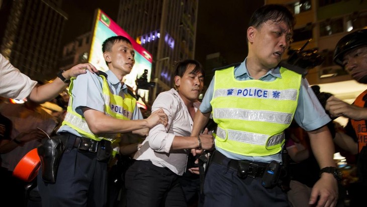 香港警方逮捕19名涉嫌斗殴者 - ảnh 1