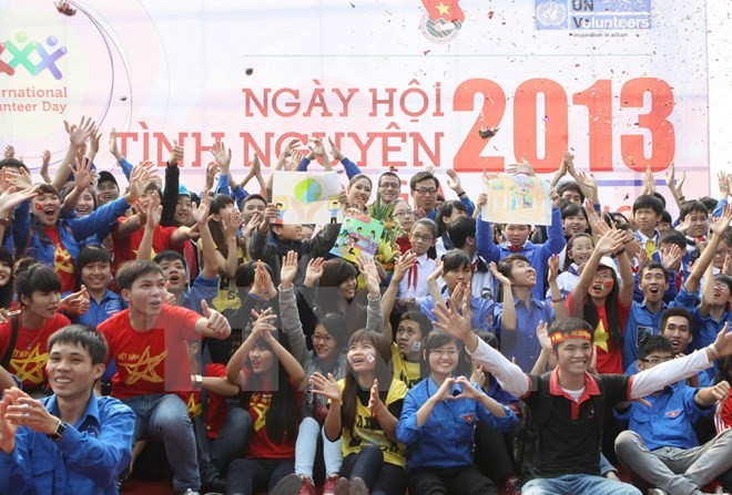  越南举行2014年国家志愿者日      - ảnh 1