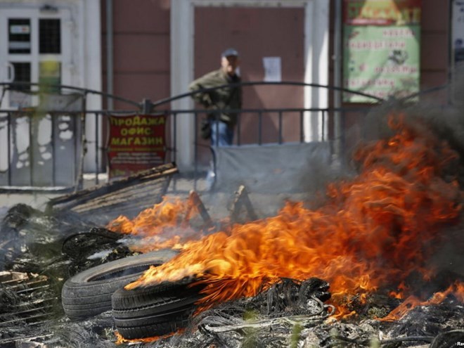 乌克兰支持独立的东部民间武装在新年第一天发起进攻 - ảnh 1
