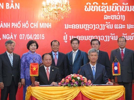 老挝领导人会见胡志明市高级代表团 - ảnh 1