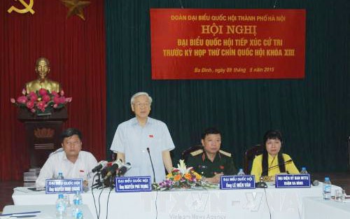 越南党、国家和政府领导人接触各地选民 - ảnh 1
