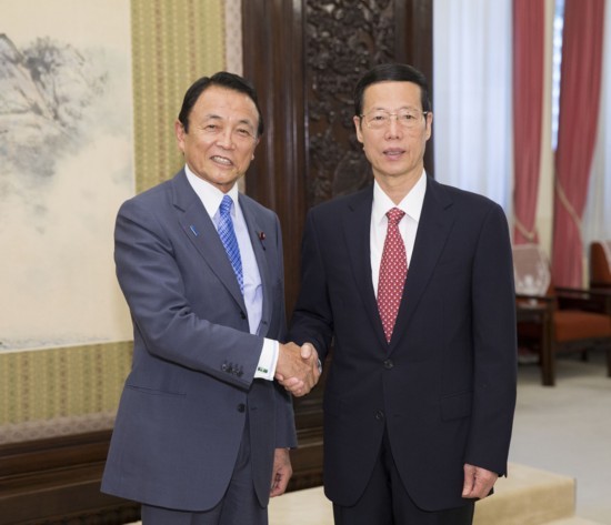 日本和中国一致同意推动双边关系发展 - ảnh 1