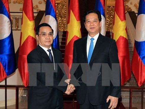 老挝总理通辛圆满结束对越南的访问 - ảnh 1