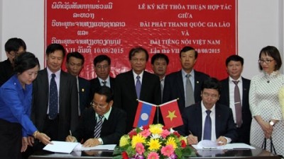 越南之声广播电台与老挝国家广播电台签署合作协议 - ảnh 1