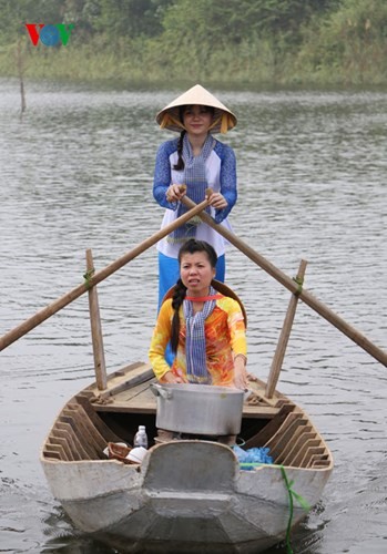 在河内越南民族旅游文化村再现南方水上集市文化 - ảnh 4