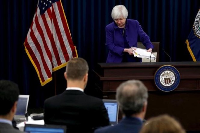 美联储对威胁美国经济前景的危机表示关切 - ảnh 1
