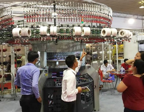 越南纺织品服装原辅料机械设备国际展在胡志明市举行 - ảnh 1
