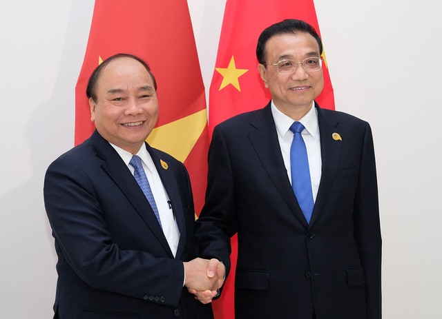 阮春福会见中国国务院总理李克强和泰国总理巴育   - ảnh 1