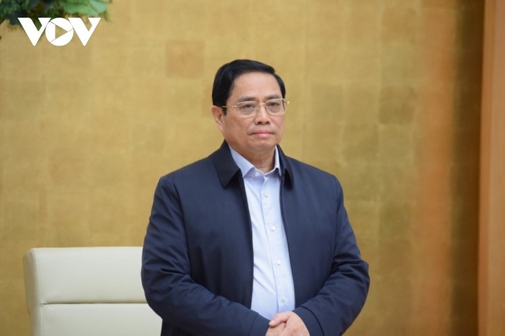 越南政府总理范明政：灵活实施货币政策，确保经济稳定 - ảnh 1