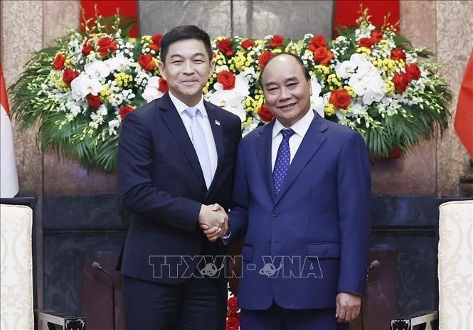 越南国家主席阮春福会见新加坡国会议长陈川仁 - ảnh 1