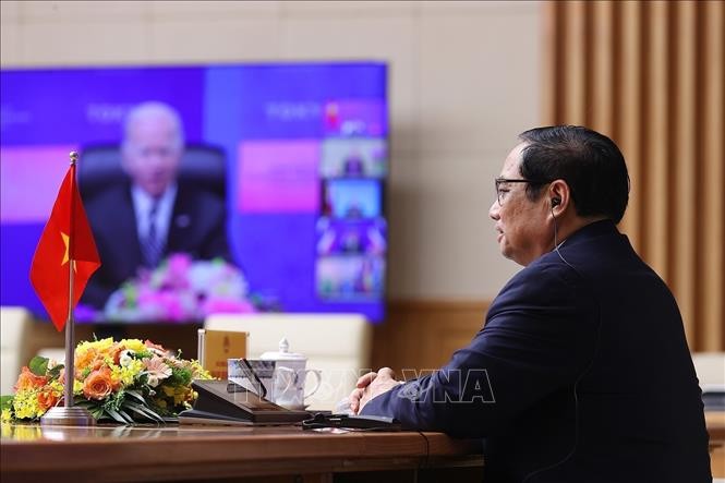 越南政府总理范明政以视频方式出席启动IPEF讨论会公布仪式 - ảnh 1