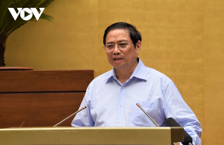 越南政府总理范明政：越南建设独立自主经济，积极、主动、务实、有效深入融入国际 - ảnh 1