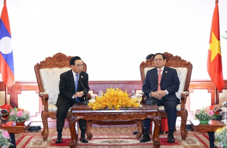 越南政府总理范明政会见老挝政府总理潘坎•维帕万 - ảnh 1