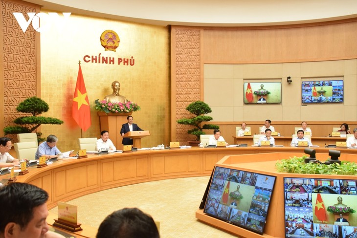 越南政府总理范明政主持政府与各地方视频会议 - ảnh 1