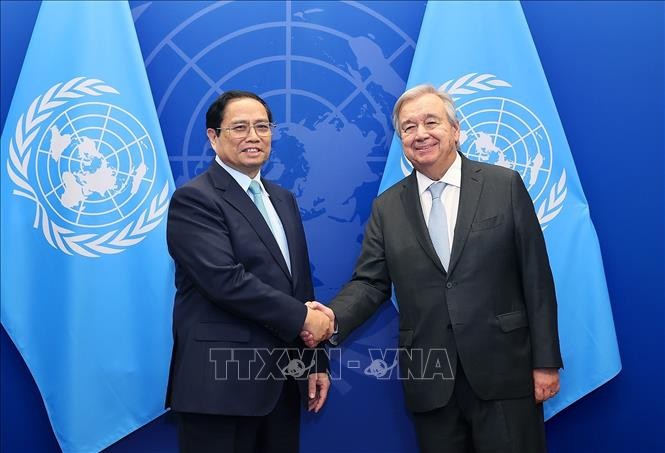 越南政府总理范明政会见联合国秘书长古特雷斯 - ảnh 1