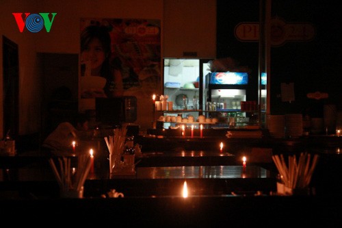 Ibukota Hanoi - satu jam tanpa cahaya lampu - ảnh 6