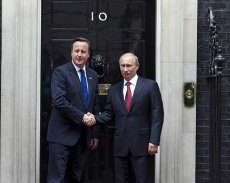Pemimpin Rusia dan Inggeris membahas situasi Suriah, kerjasama energi dan ekonomi - ảnh 1