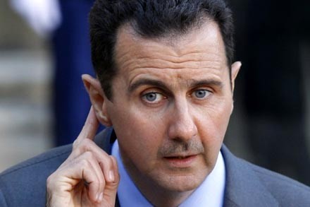 Presiden Suriah Bashar al-Assad memperingatkan akibat intervensi dari luar - ảnh 1