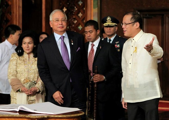 Presiden Filipina melakukan kunjungan resmi di Malaysia - ảnh 1