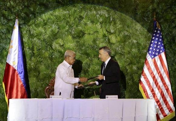 Filipina dan Amerika Serikat menanda-tangani permufakatan pertahanan baru - ảnh 1