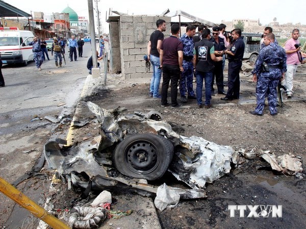 Irak: serangan bom yang berlumuran darah di ibukota Baghdad, kira-kira 140 orang yang menjadi korban - ảnh 1