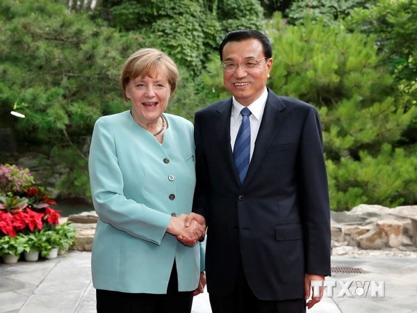 Tiongkok dan Jerman menanda-tangani banyak permufakatan kerjasama - ảnh 1