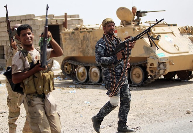 Irak menolak kemungkinan mengijinkan tentara asing masuk wilayahnya - ảnh 1