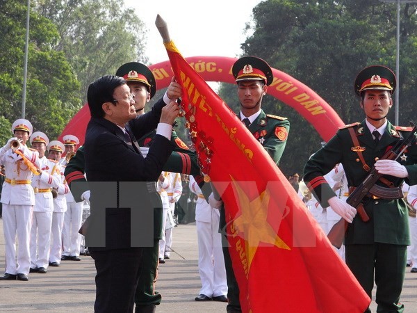 Presiden Truong Tan Sang menghadiri acara peringatan ultah ke-70 Berdirinya Sekolah Perwira Angkatan Darat 1 - ảnh 1