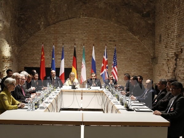 Kelompok P5+1 sepakat menghapuskan sanksi terhadap Iran - ảnh 1