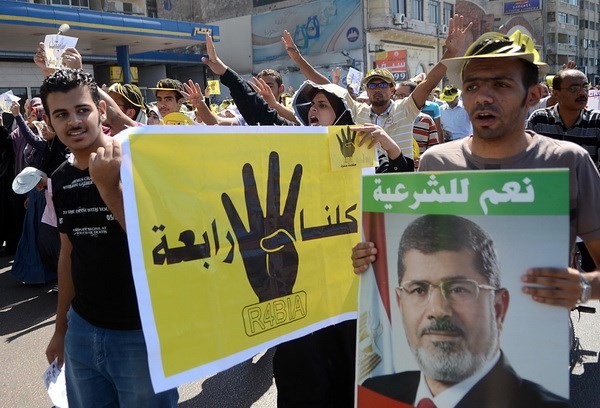 Mesir membubarkan demonstrasi-demonstrasi yang mendukung MB di Giza dan Helwan - ảnh 1