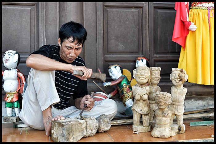 Daya hidup dari kerajinan memahat kayu di desa Bao Ha - ảnh 11