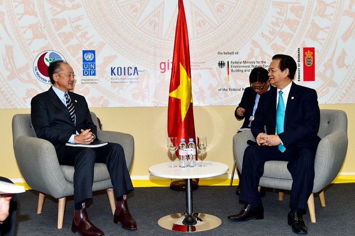 Komunitas internasional berkomitmen mendukung dan membantu Vietnam dalam usaha pengembangan Tanah Air - ảnh 1