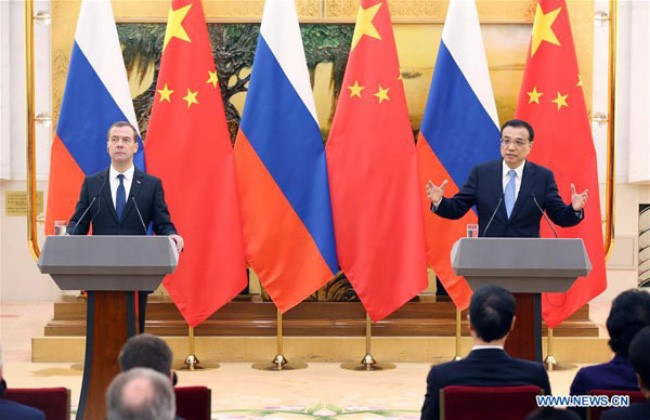 Rusia dan Tiongkok menanda-tangani kira-kira 30 permufakatan kerjasama - ảnh 1