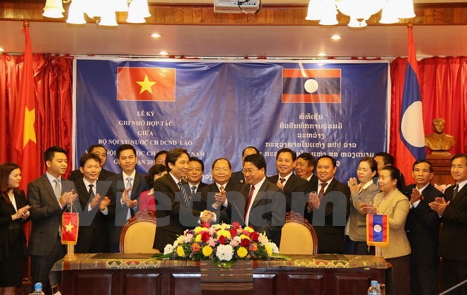 Kementerian Dalam Negeri Vietnam dan Laos memperkuat kerjasama - ảnh 1