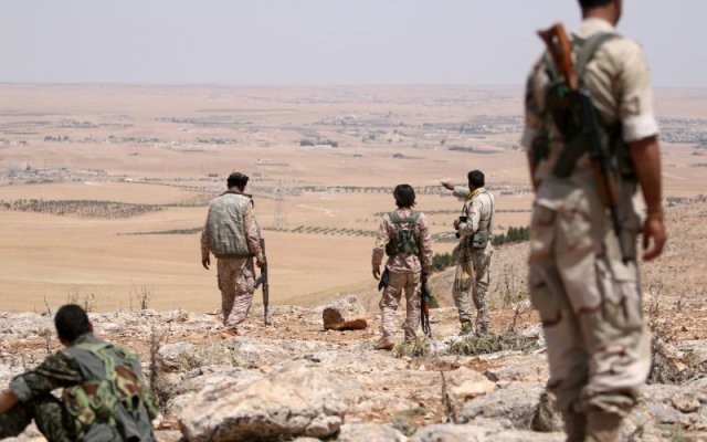 Suriah: Pasukan yang disokong Amerika Serikat mendekati benteng IS di Manbij - ảnh 1