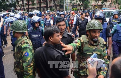 Yang melakukan serangan di Bangladesh adalah para milisi dalam negeri bukan IS - ảnh 1