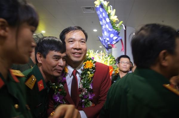 Penyambutan kontingen olahraga Vietnam pemenang medali emas Olympiade yang bersejarah - ảnh 1