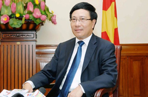 Außenminister Minh beantwortet Fragen über die ASEAN-Gemeinschaft - ảnh 1