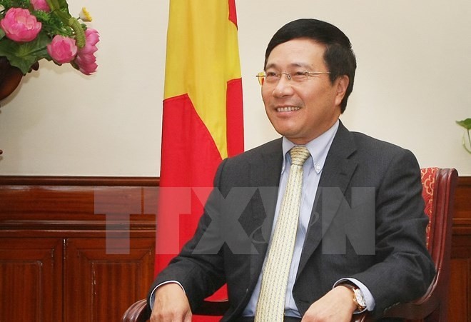 Vizepremierminister, Außenminister Pham Binh Minh besucht Südkorea - ảnh 1
