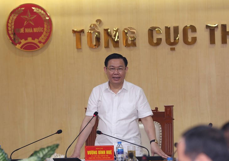 Vizepremierminister Vuong Dinh Hue tagt mit Steuerbehörde  - ảnh 1