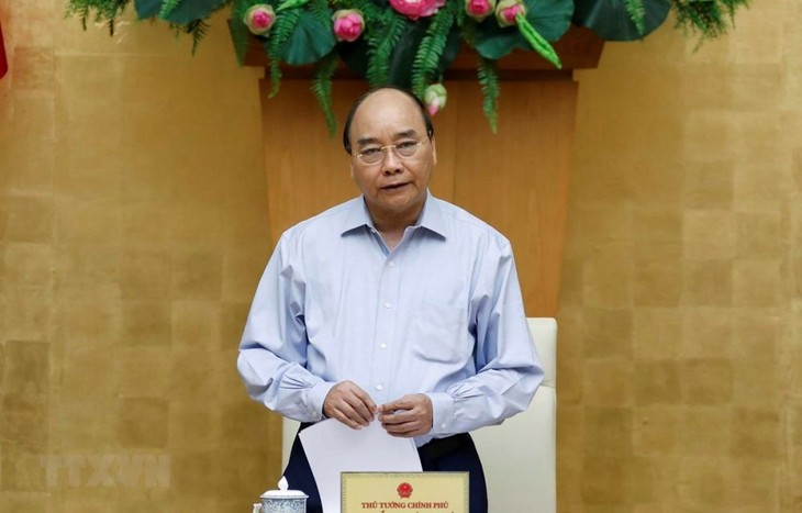 Premierminister Nguyen Xuan Phuc: Vietnam muss entschlossen sein, die Covid-19-Epidemie einzudämmen - ảnh 1