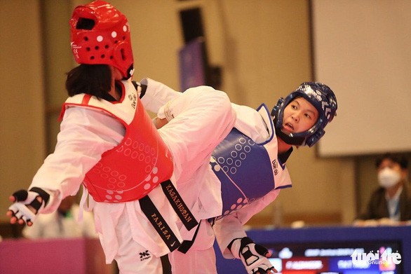 Taekwondoin Truong Thi Kim Tuyen gewinnt Goldmedaille beim Asien-Taekwondo-Meisterschaft 2021 - ảnh 1