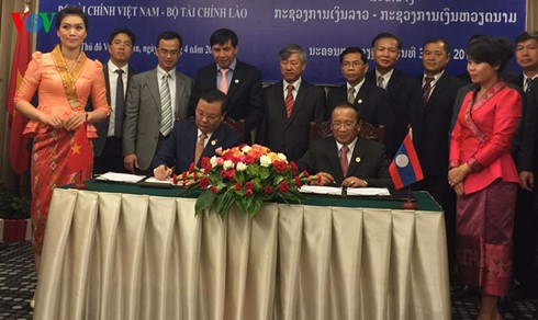 越南财政部与老挝财政部加强合作 - ảnh 1