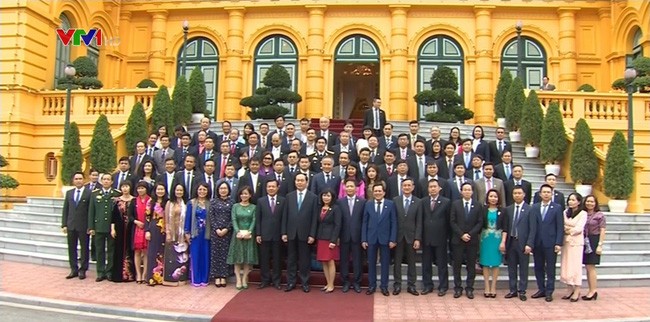 Staatspräsident Tran Dai Quang trifft Vertreter der Unternehmen mit nationalen Markenzeichen - ảnh 1