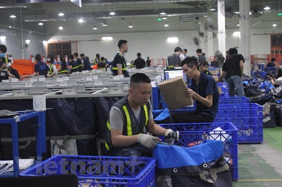 Vietnamesische Unternehmen exportieren Waren von fast 60 Milliarden US-Dollar in vergangenen neun Monaten - ảnh 1
